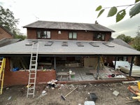 a new roof is being installed on a house